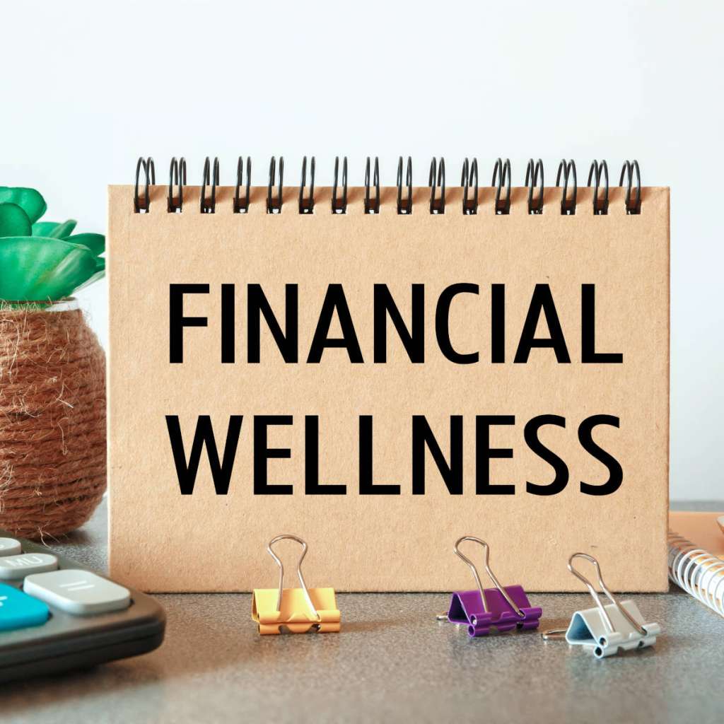Notebook with text Financial Wellness